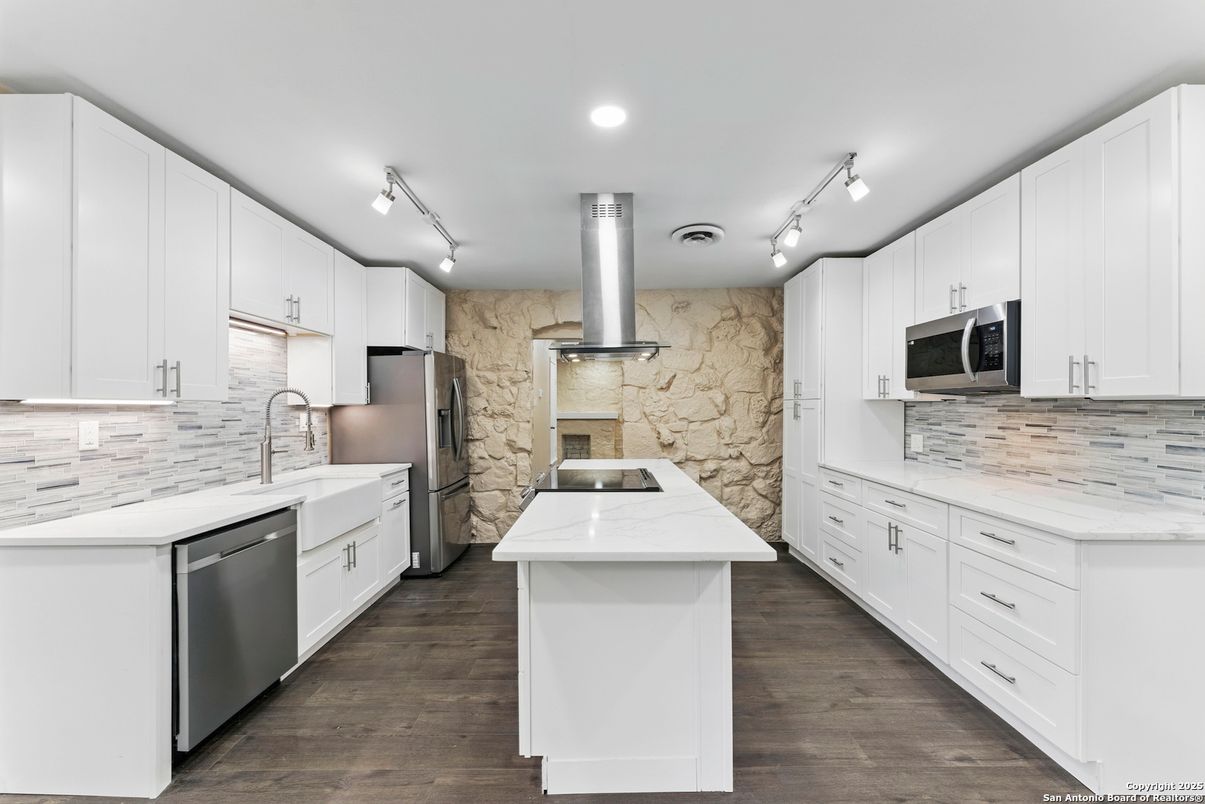Interior, Kitchen, Marble Walls, Recessed Lighting, Stainless Steel Appliances, Stone Walls, Wood Texture Flooring