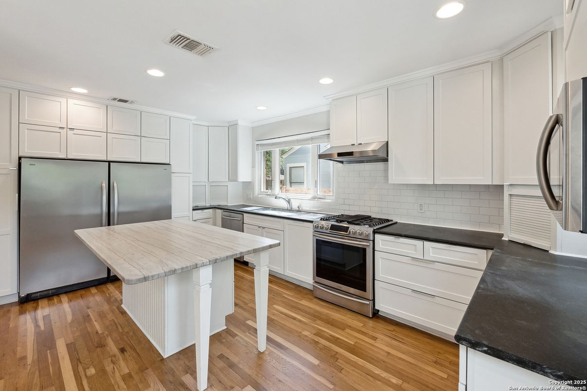 Interior, Kitchen, Recessed Lighting, Stainless Steel Appliances, Wood Texture Flooring