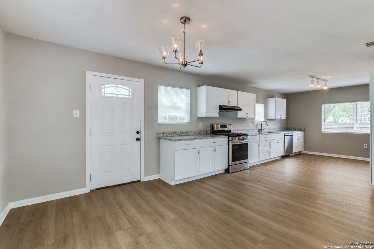 Chandelier, Empty room, Interior, Kitchen, Pendant Lights, Stainless Steel Appliances, Wood Texture Flooring