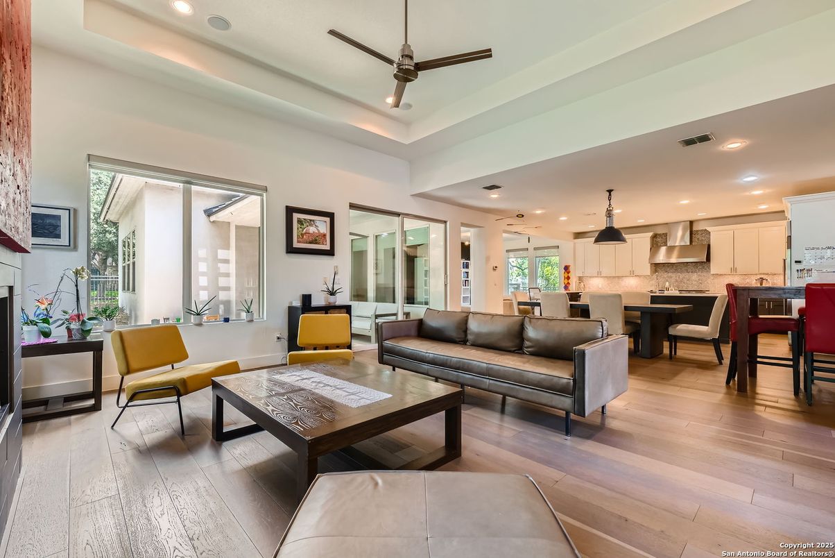 Dining room, Interior, Kitchen, Living room, Pendant Lights, Recessed Lighting, Stainless Steel Appliances, Wood Texture Flooring
