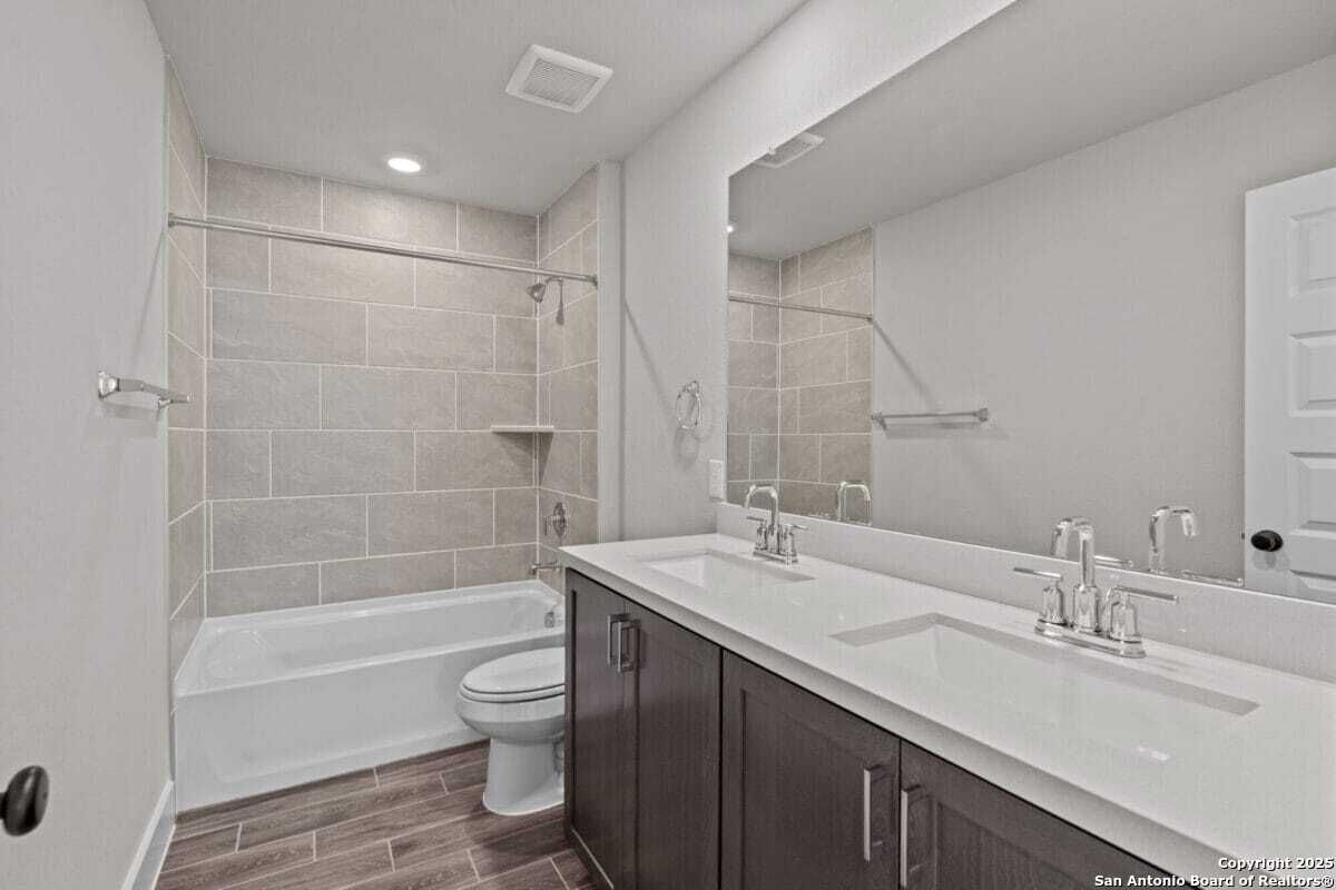 Bathroom, Dual Sink Vanities, Interior, Recessed Lighting, Wood Texture Flooring