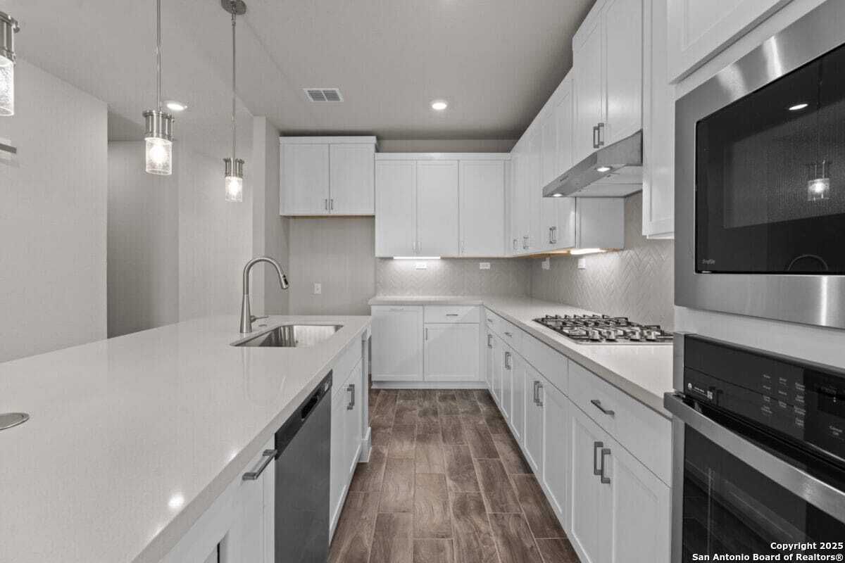 Interior, Kitchen, Pendant Lights, Recessed Lighting, Stainless Steel Appliances, Wood Texture Flooring