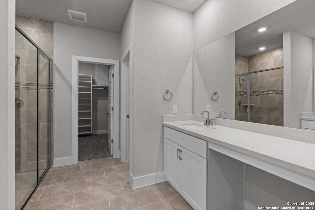 Bathroom, Dual Sink Vanities, Glass Shower, Interior, Recessed Lighting, Walk-in Closets