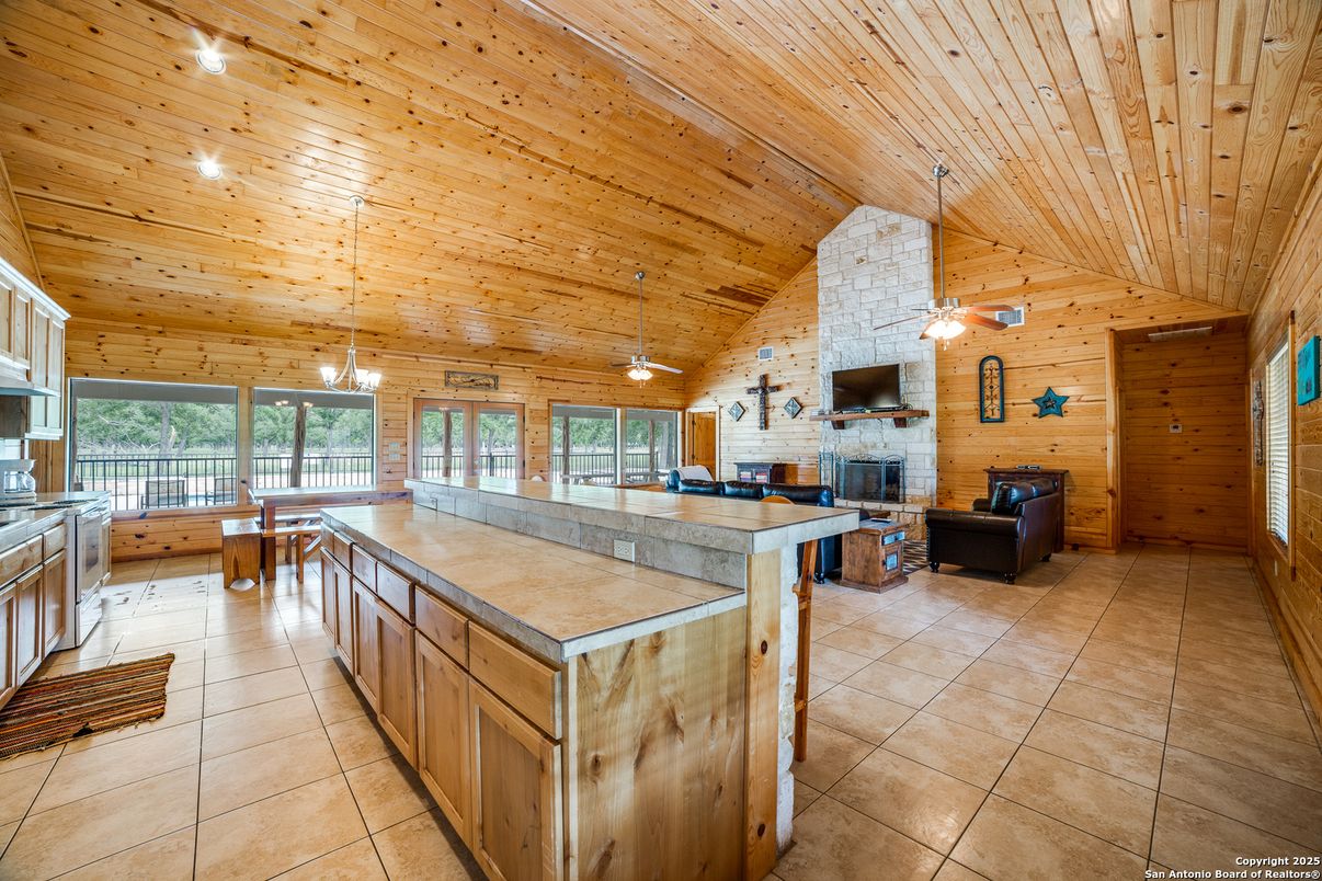 Fireplace, Interior, Kitchen, Living room, Pendant Lights, Stone Walls, Wooden Ceilings, Wooden Walls