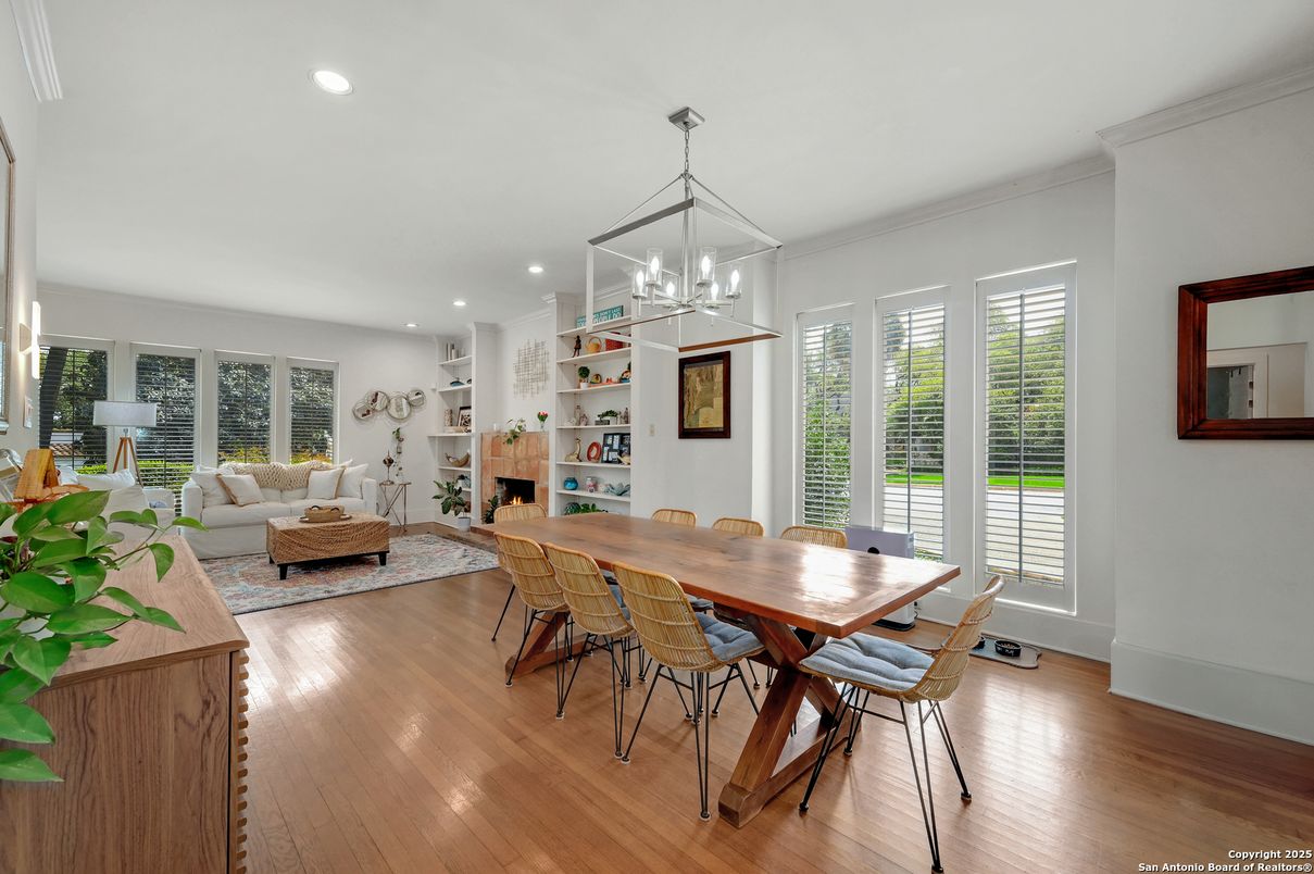Dining room, Fireplace, Interior, Living room, Pendant Lights, Recessed Lighting, Wood Texture Flooring