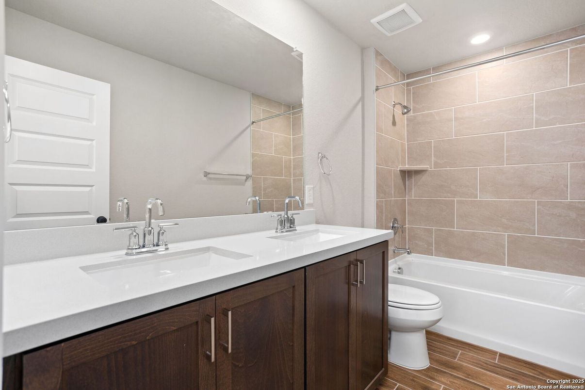 Bathroom, Dual Sink Vanities, Interior, Recessed Lighting, Wood Texture Flooring