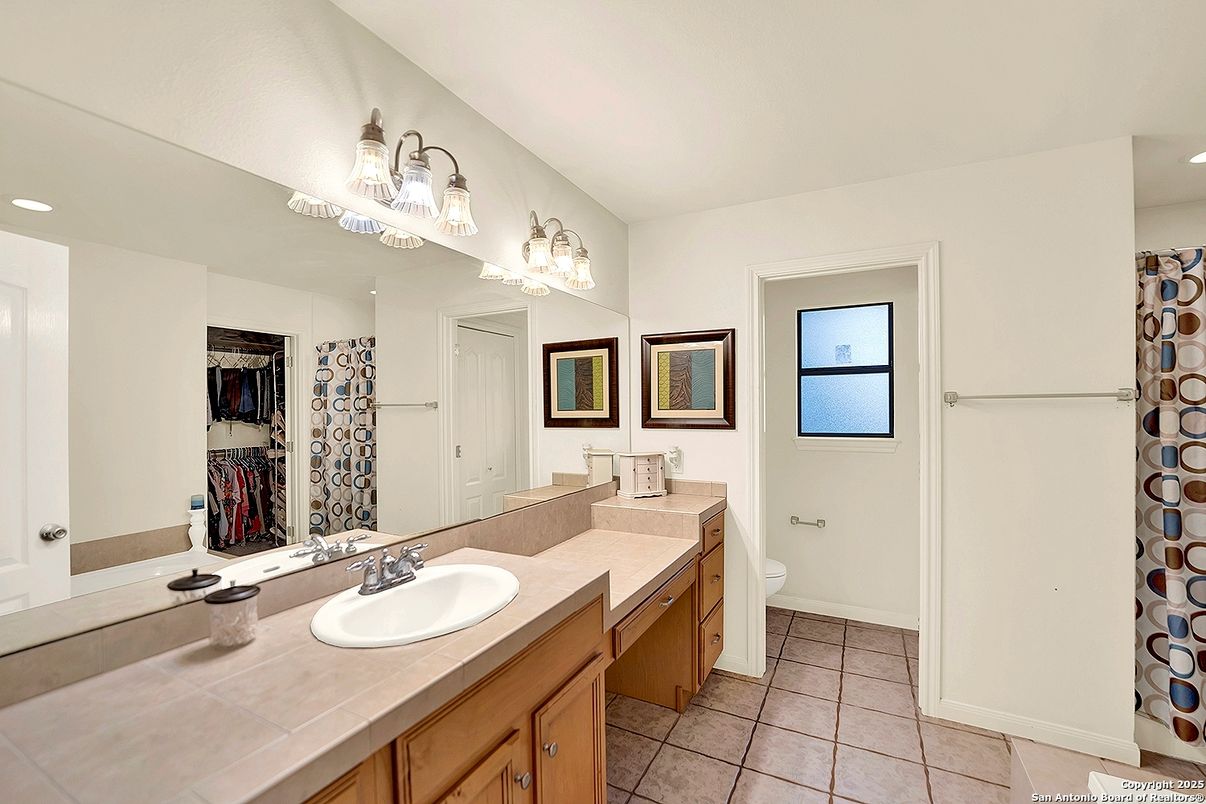 Bathroom, Dual Sink Vanities, Interior, Recessed Lighting, Tile Countertops