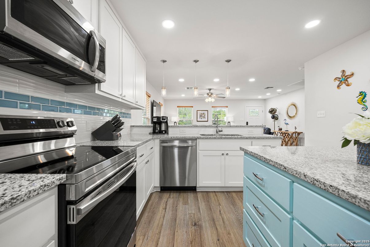 Interior, Kitchen, Pendant Lights, Recessed Lighting, Stainless Steel Appliances, Wood Texture Flooring