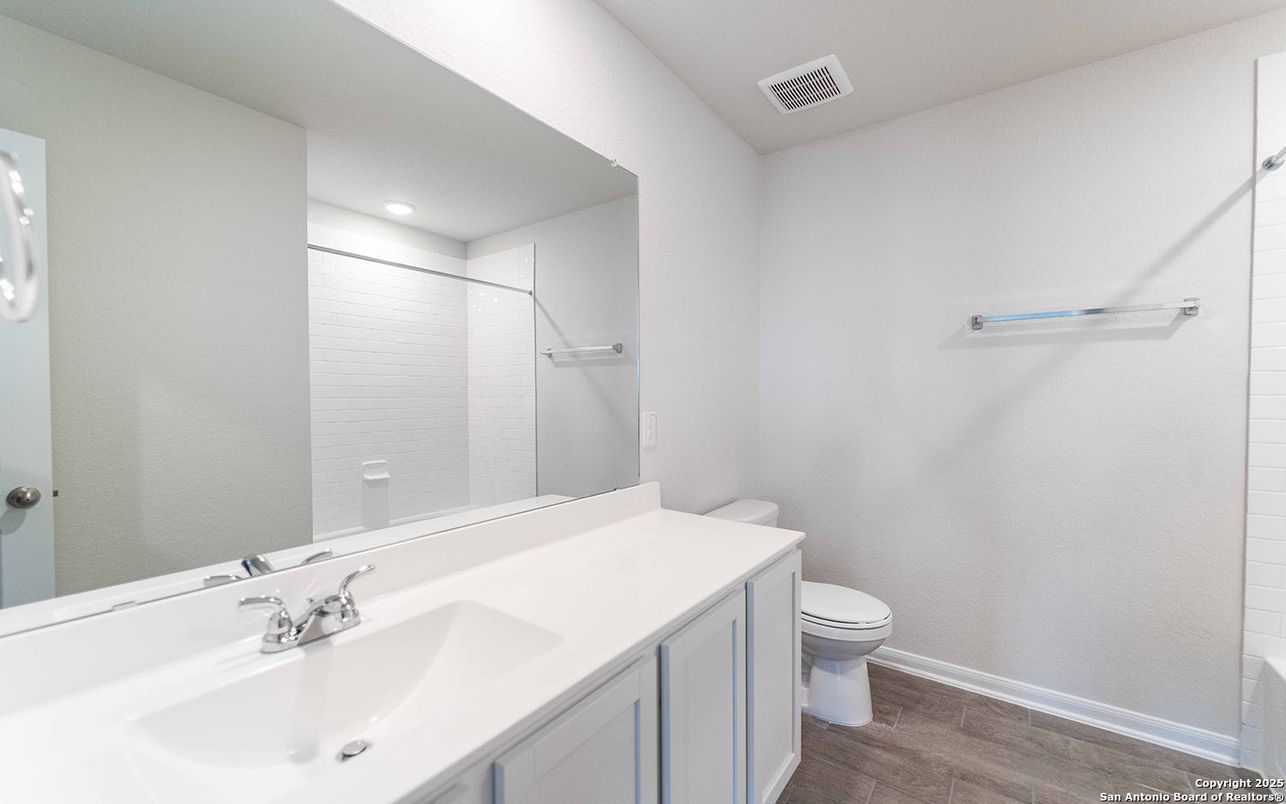 Bathroom, Dual Sink Vanities, Interior, Recessed Lighting, Wood Texture Flooring
