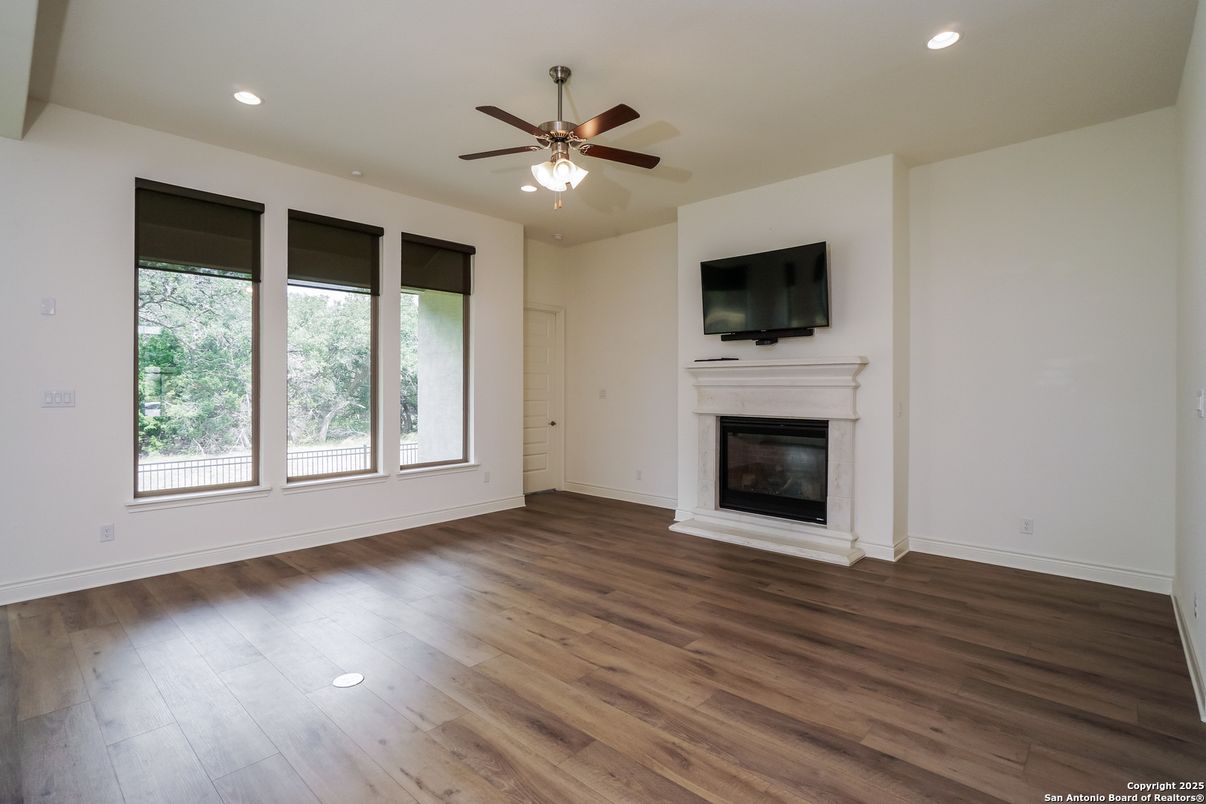 Empty room, Fireplace, Interior, Recessed Lighting, Wood Texture Flooring