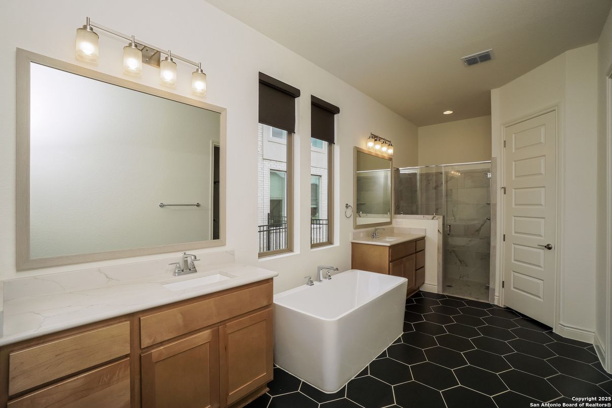 Bathroom, Dual Sink Vanities, Glass Shower, Interior, Marble Walls, Recessed Lighting