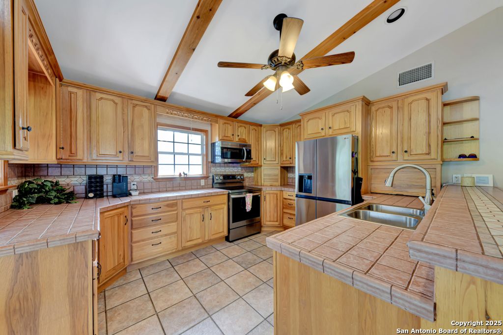 Interior, Kitchen, Stainless Steel Appliances, Tile Countertops, Wooden Beams