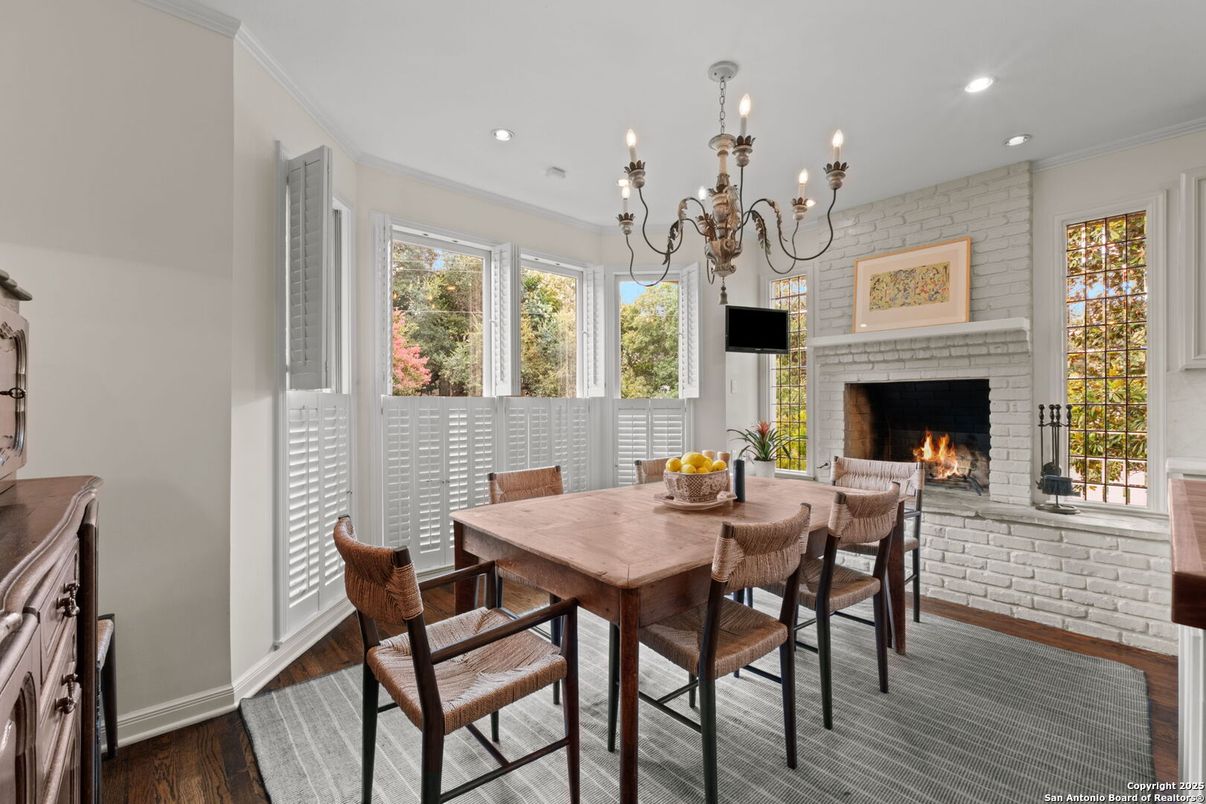 Chandelier, Dining room, Fireplace, Interior, Recessed Lighting, Wood Texture Flooring