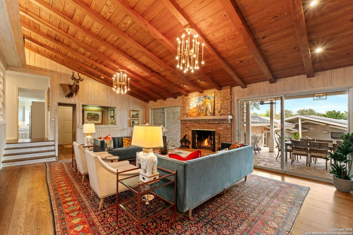 Chandelier, Fireplace, Interior, Living room, Stone Walls, Wooden Beams, Wooden Ceilings, Wood Texture Flooring