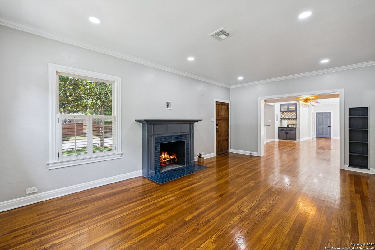Empty room, Fireplace, Interior, Recessed Lighting, Wood Texture Flooring