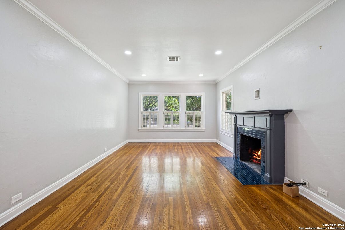 Empty room, Fireplace, Interior, Recessed Lighting, Wood Texture Flooring
