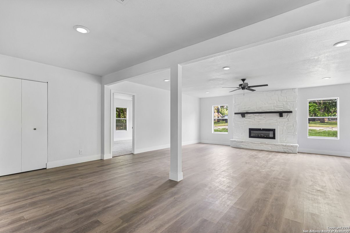 Empty room, Fireplace, Interior, Recessed Lighting, Wood Texture Flooring