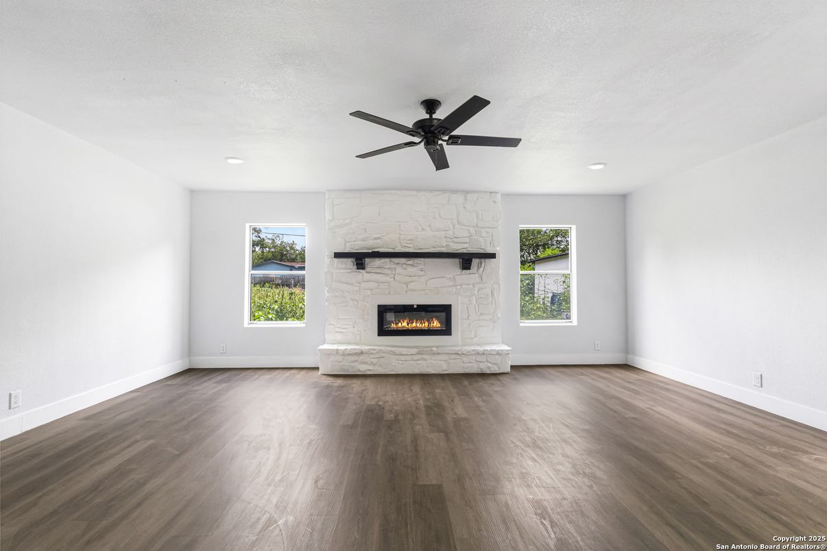 Empty room, Fireplace, Interior, Recessed Lighting, Wood Texture Flooring