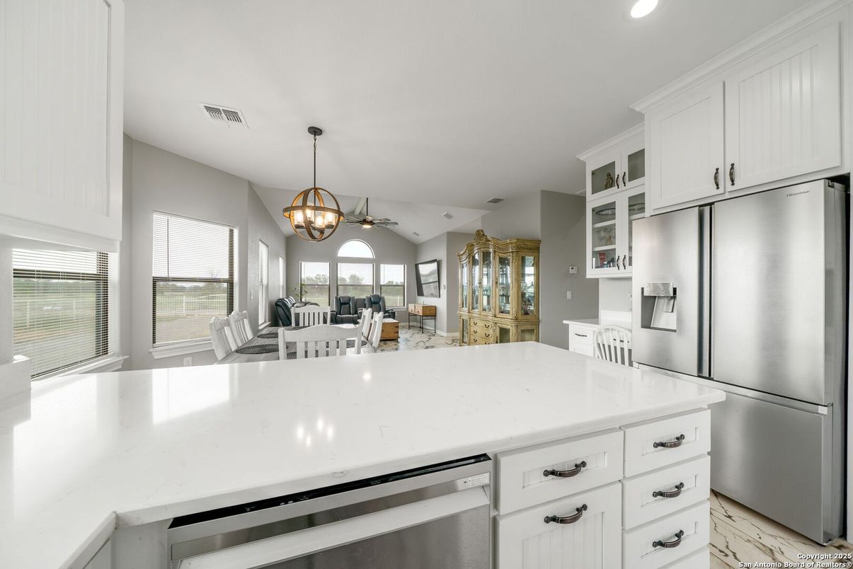 Chandelier, Dining room, Interior, Kitchen, Marble, Pendant Lights, Recessed Lighting, Stainless Steel Appliances