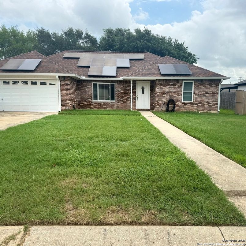 Attached, Exterior, Facade, Brick Facade, Solar Panels, Ranch