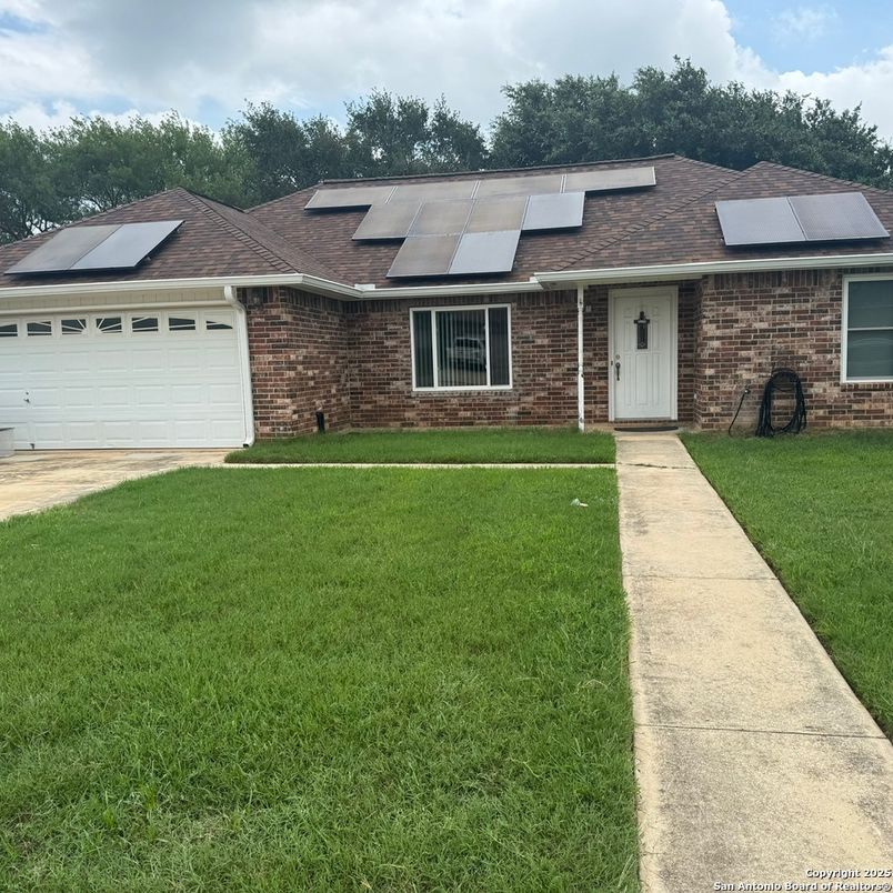 Attached, Exterior, Facade, Brick Facade, Solar Panels, Ranch