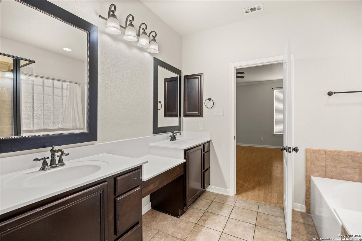 Bathroom, Dual Sink Vanities, Interior, Recessed Lighting, Wood Texture Flooring