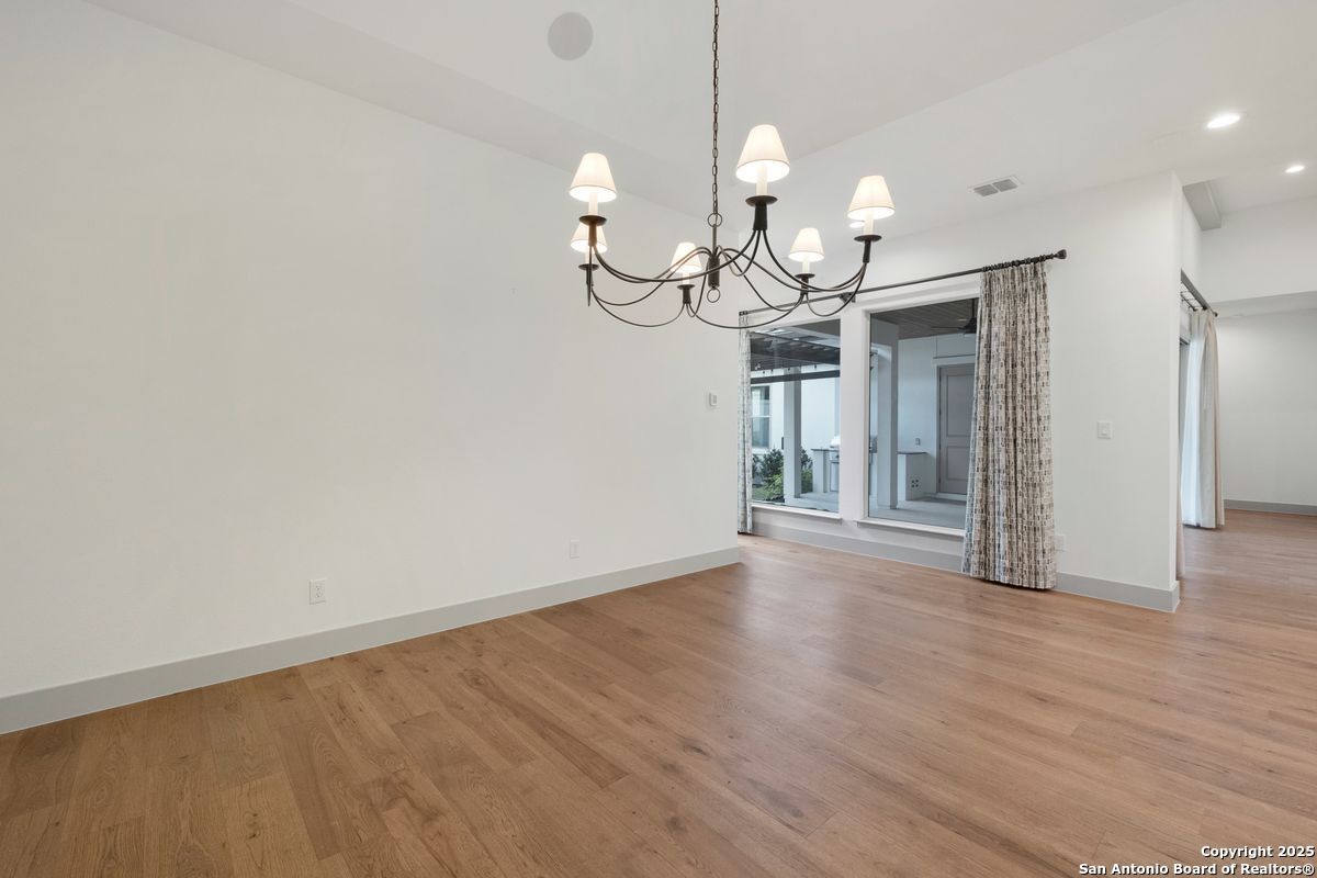 Chandelier, Empty room, Interior, Recessed Lighting, Wood Texture Flooring