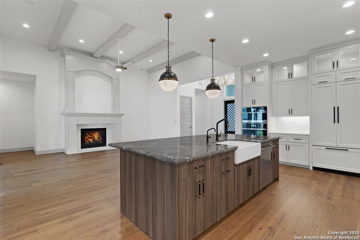 Fireplace, Interior, Kitchen, Pendant Lights, Recessed Lighting, Wood Texture Flooring