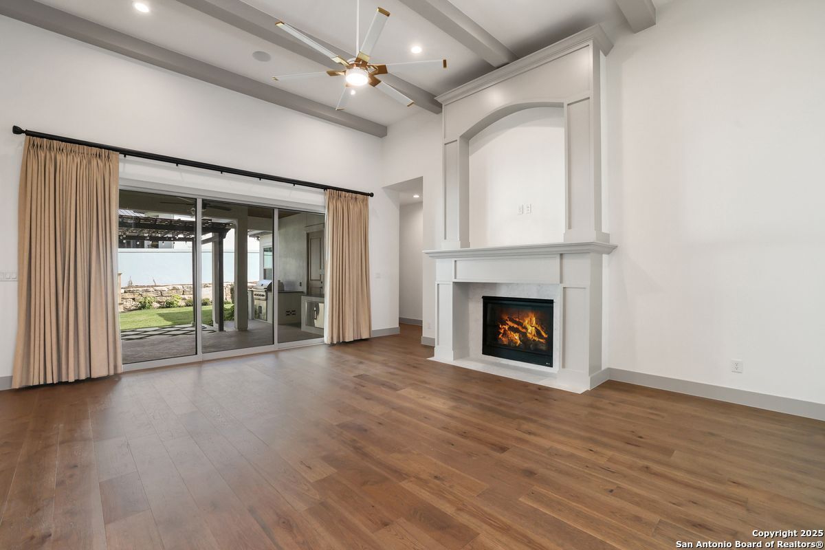 Empty room, Fireplace, Interior, Recessed Lighting, Wood Texture Flooring