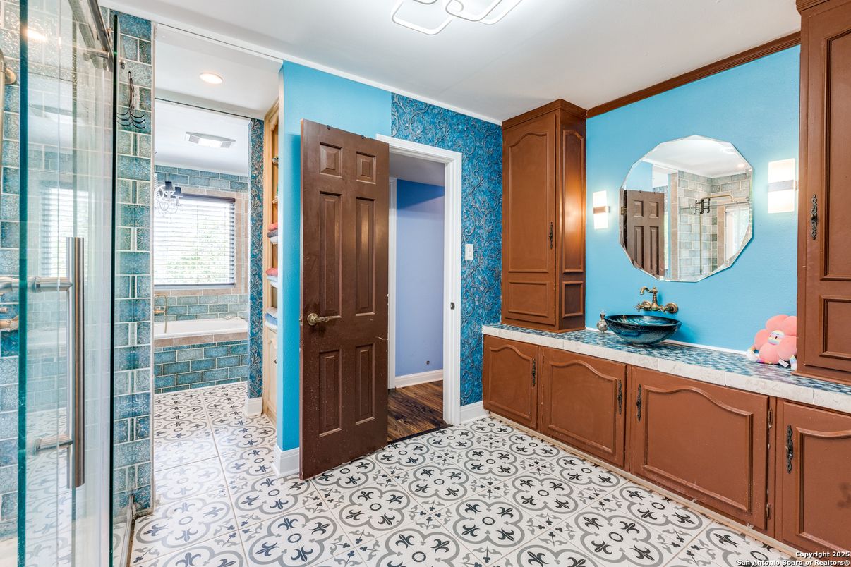 Bathroom, Dual Sink Vanities, Glass Shower, Interior, Recessed Lighting, Wood Texture Flooring