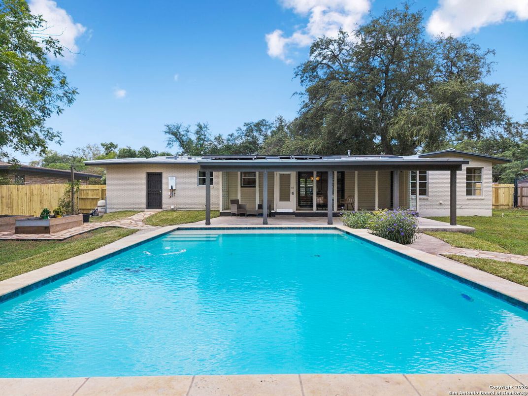 Exterior, Pool, Solar Panels