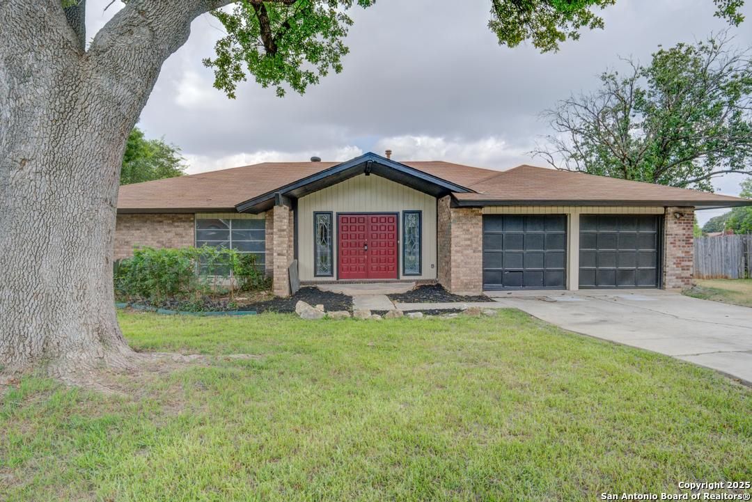 Attached, Backyard, Exterior, Facade, Brick Facade, Ranch
