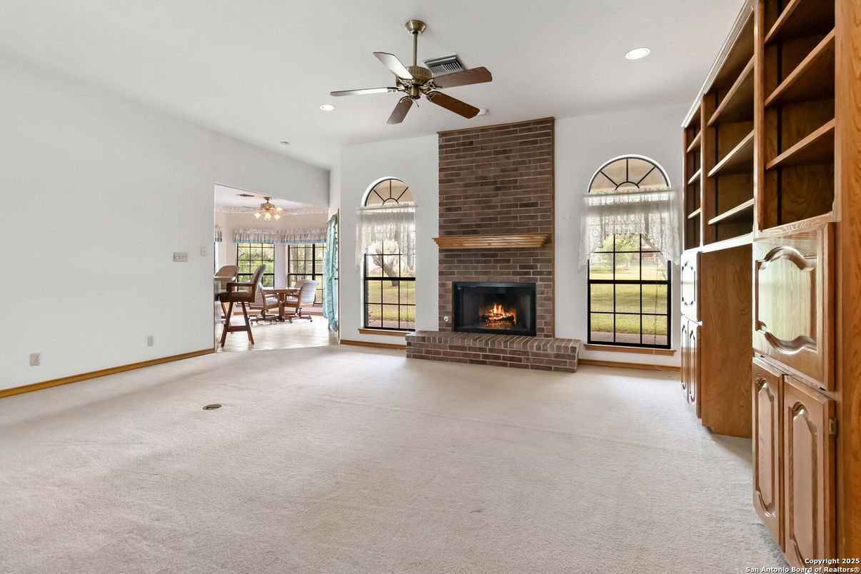 Dining room, Empty room, Fireplace, Interior, Recessed Lighting, Stone Walls
