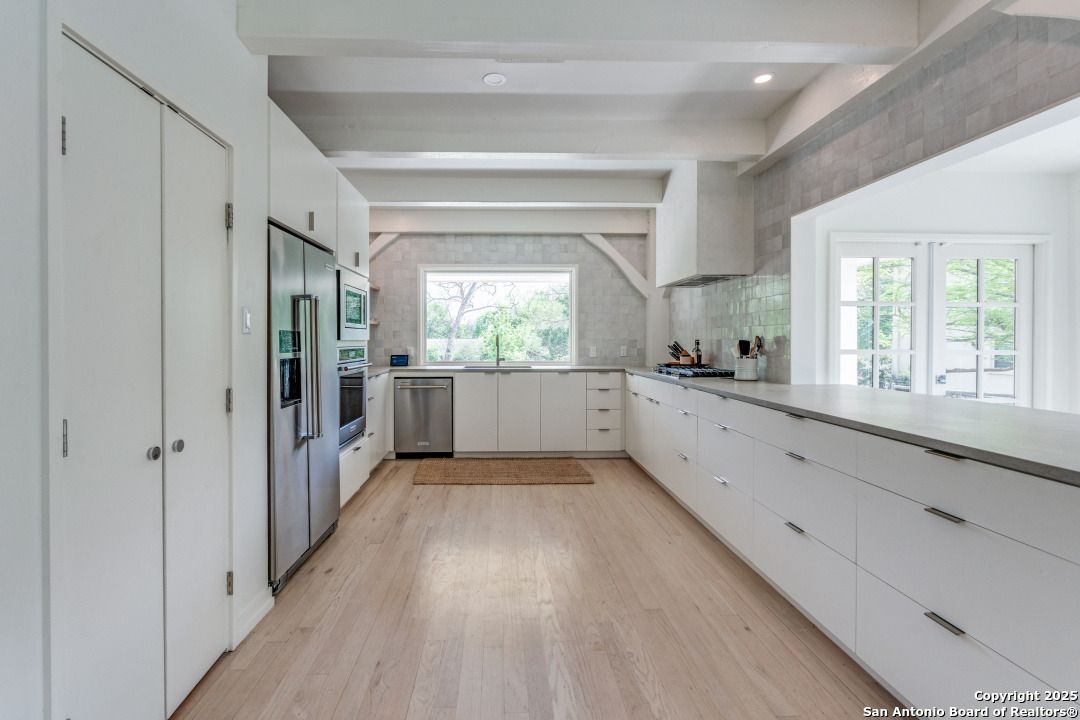 Interior, Kitchen, Recessed Lighting, Stainless Steel Appliances, Wood Texture Flooring