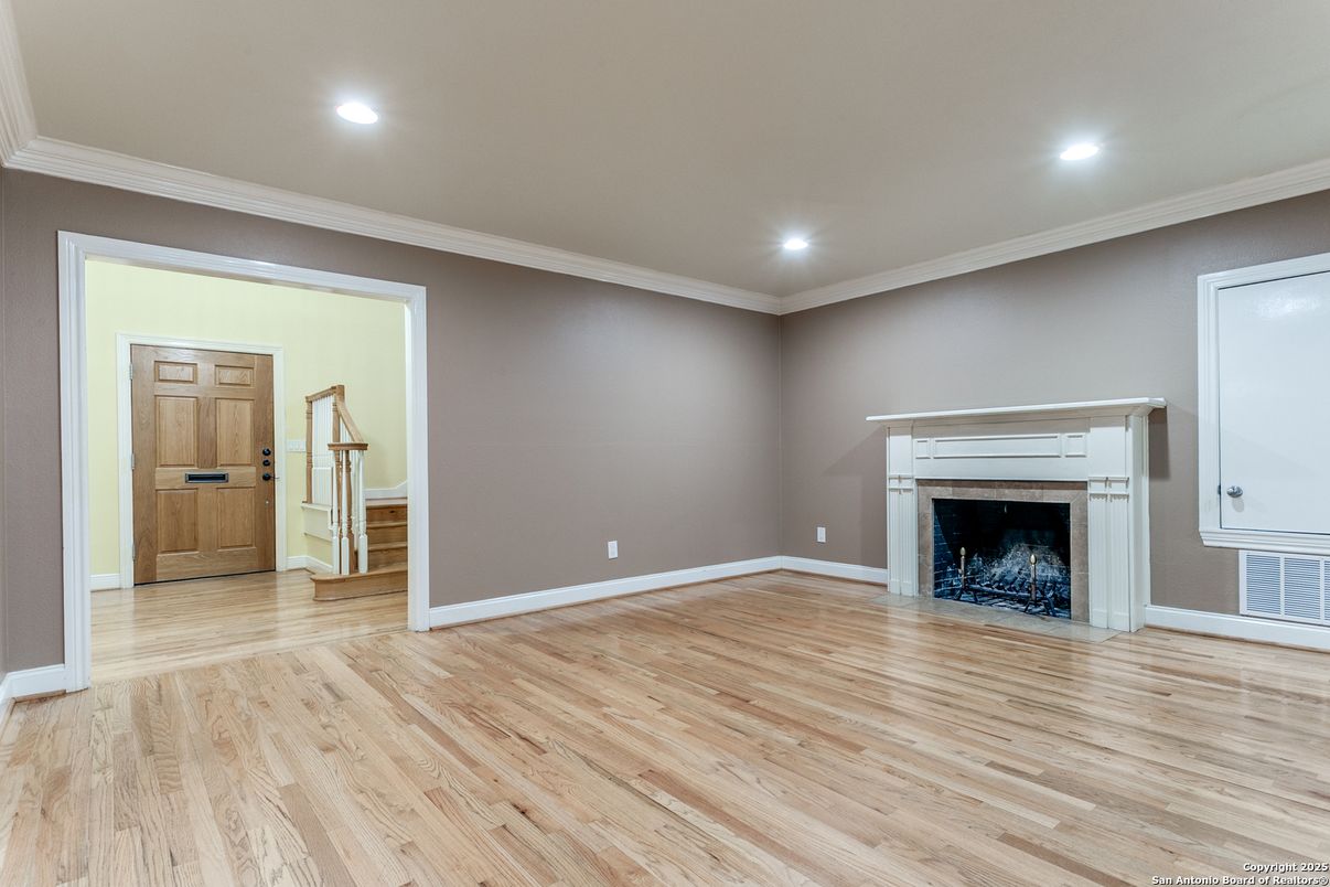 Empty room, Fireplace, Interior, Recessed Lighting, Wood Texture Flooring