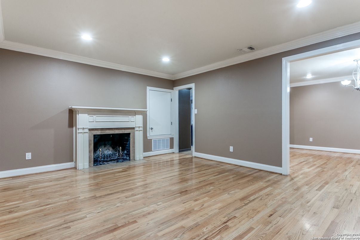 Empty room, Fireplace, Interior, Recessed Lighting, Wood Texture Flooring