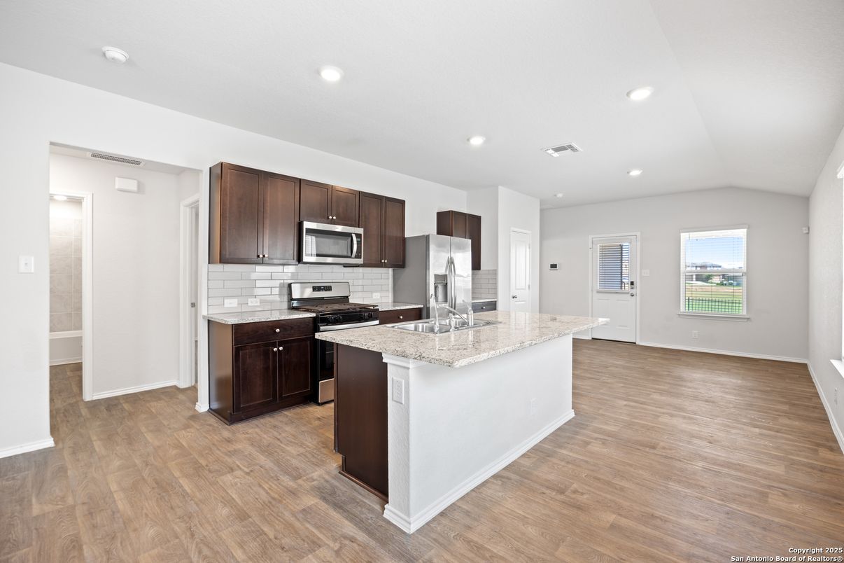 Interior, Kitchen, Recessed Lighting, Stainless Steel Appliances, Wood Texture Flooring