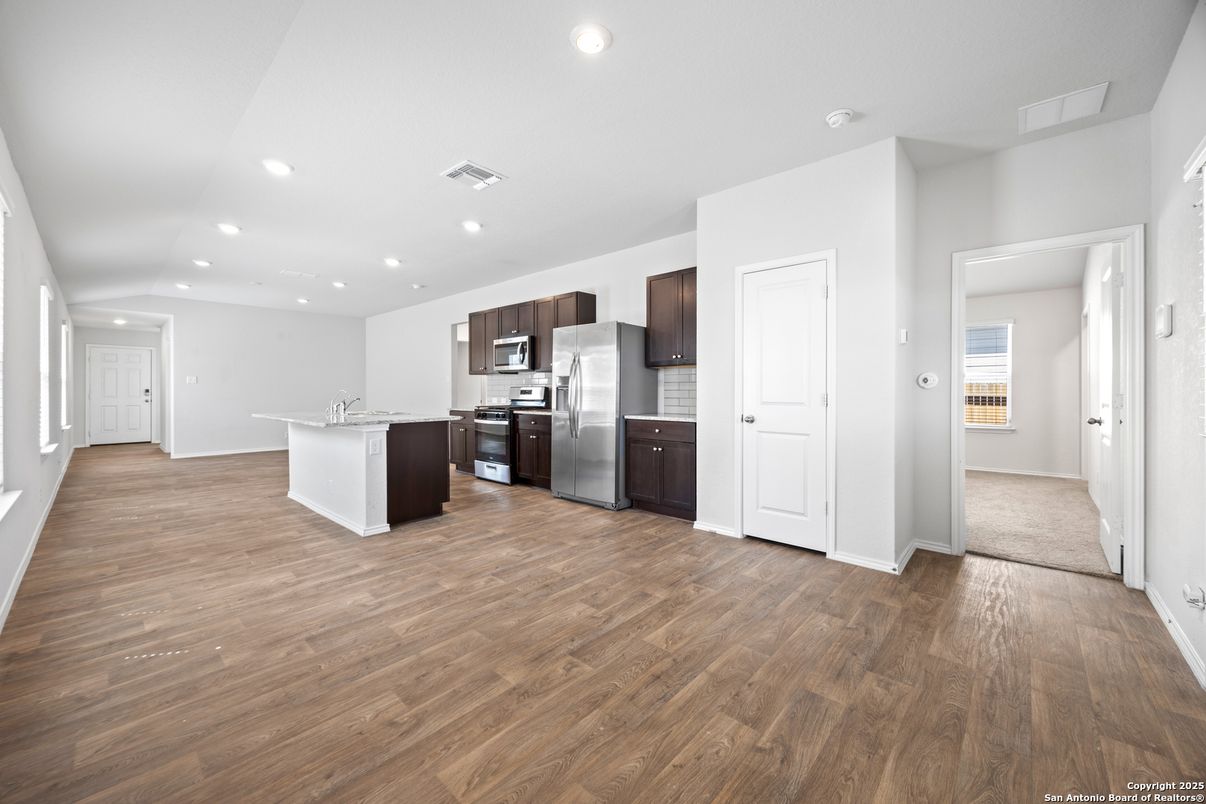 Interior, Kitchen, Recessed Lighting, Stainless Steel Appliances, Wood Texture Flooring