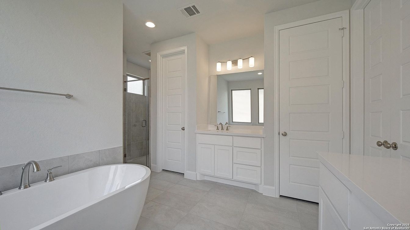 Bathroom, Dual Sink Vanities, Free Standing Baths, Glass Shower, Interior, Recessed Lighting