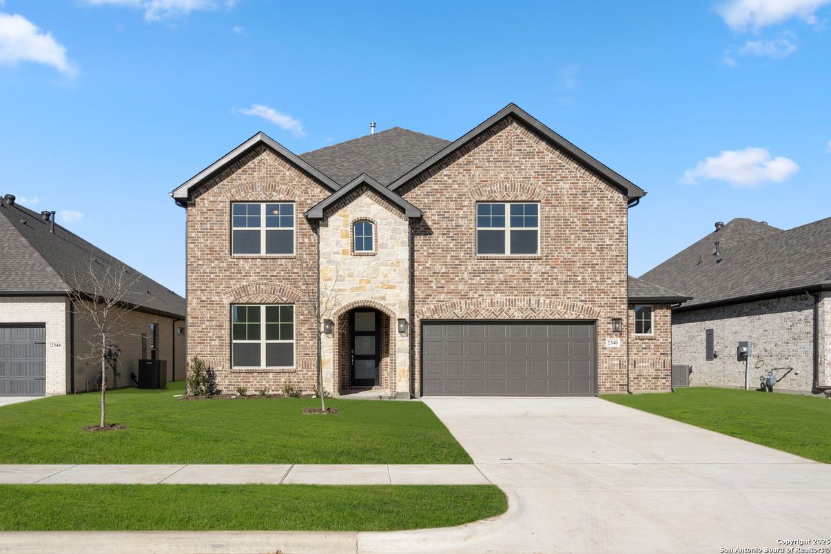 Attached, Exterior, Facade, Brick Facade, Brick Traditional
