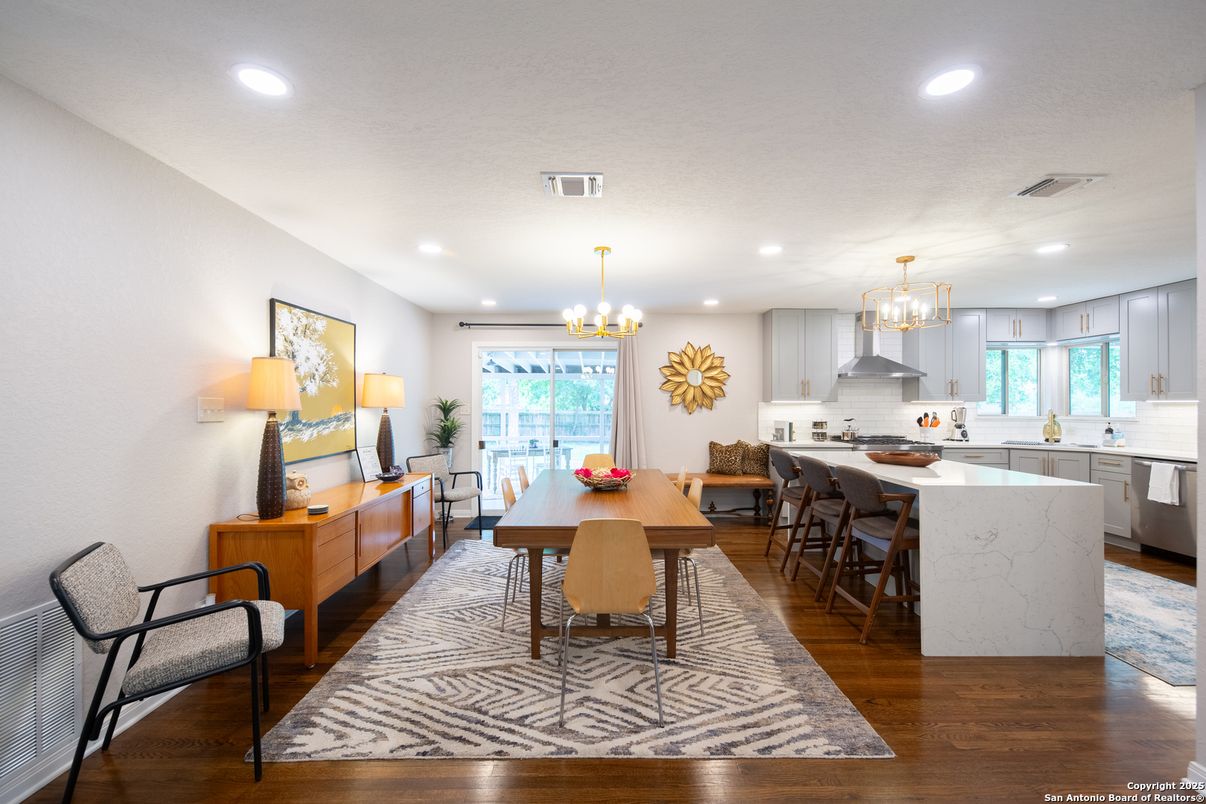 Chandelier, Dining room, Interior, Kitchen, Recessed Lighting, Stainless Steel Appliances, Wood Texture Flooring