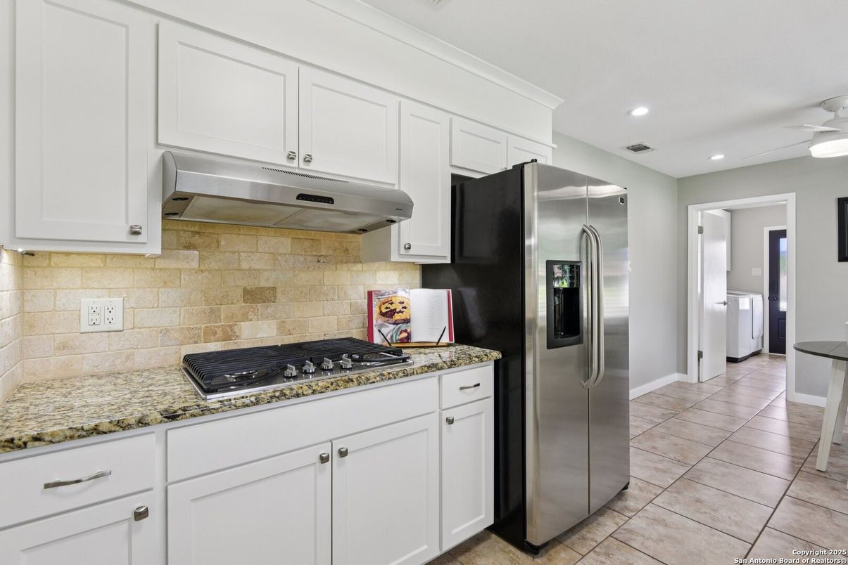 Interior, Kitchen, Recessed Lighting, Stainless Steel Appliances, Stone Walls