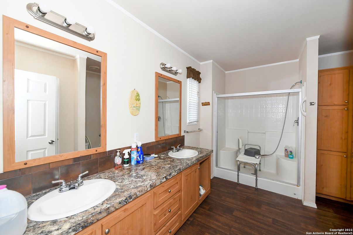 Bathroom, Dual Sink Vanities, Glass Shower, Interior, Wood Texture Flooring