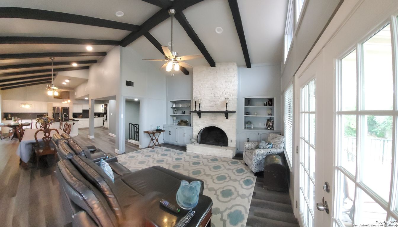 Dining room, Fireplace, Interior, Kitchen, Living room, Pendant Lights, Recessed Lighting, Stone Walls, Wooden Beams, Wood Texture Flooring