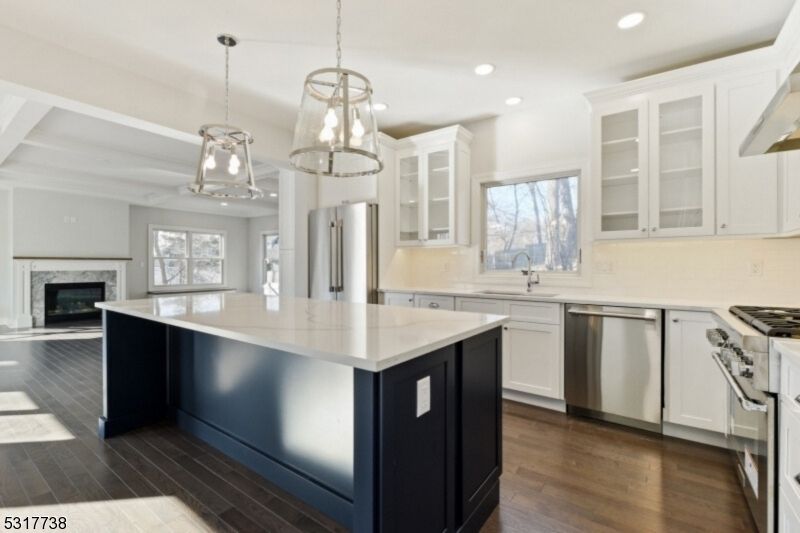 Fireplace, Interior, Kitchen, Pendant Lights, Recessed Lighting, Stainless Steel Appliances, Wood Texture Flooring