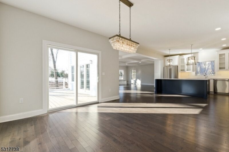 Chandelier, Interior, Kitchen, Pendant Lights, Recessed Lighting, Stainless Steel Appliances, Wood Texture Flooring