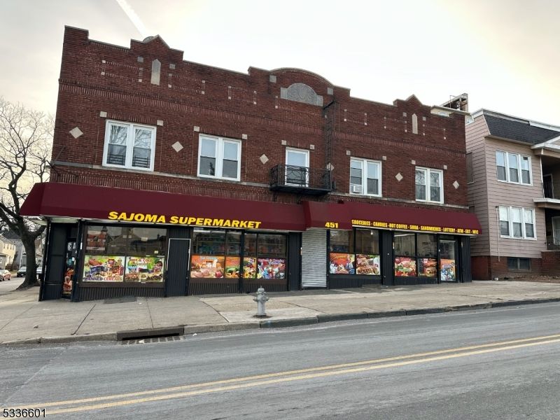 Exterior, Facade, Brick Facade, Condo Building