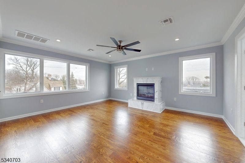 Empty room, Fireplace, Interior, Recessed Lighting, Wood Texture Flooring