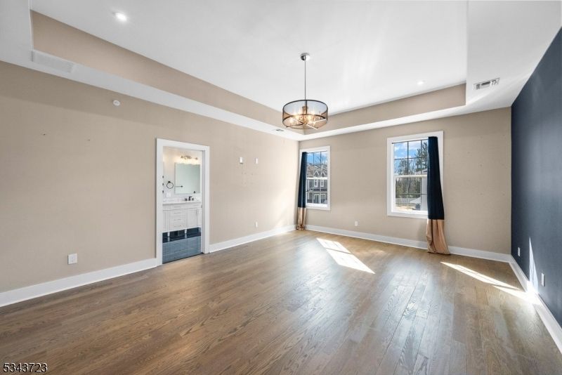 Chandelier, Empty room, Fireplace, Interior, Recessed Lighting, Wood Texture Flooring