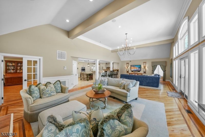 Chandelier, Fireplace, Interior, Living room, Recessed Lighting, Wood Texture Flooring